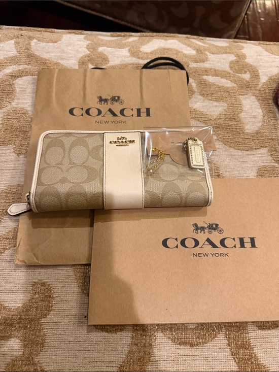 Coach Handbags - Coach Beige and Chalk Signature Continental Wallet